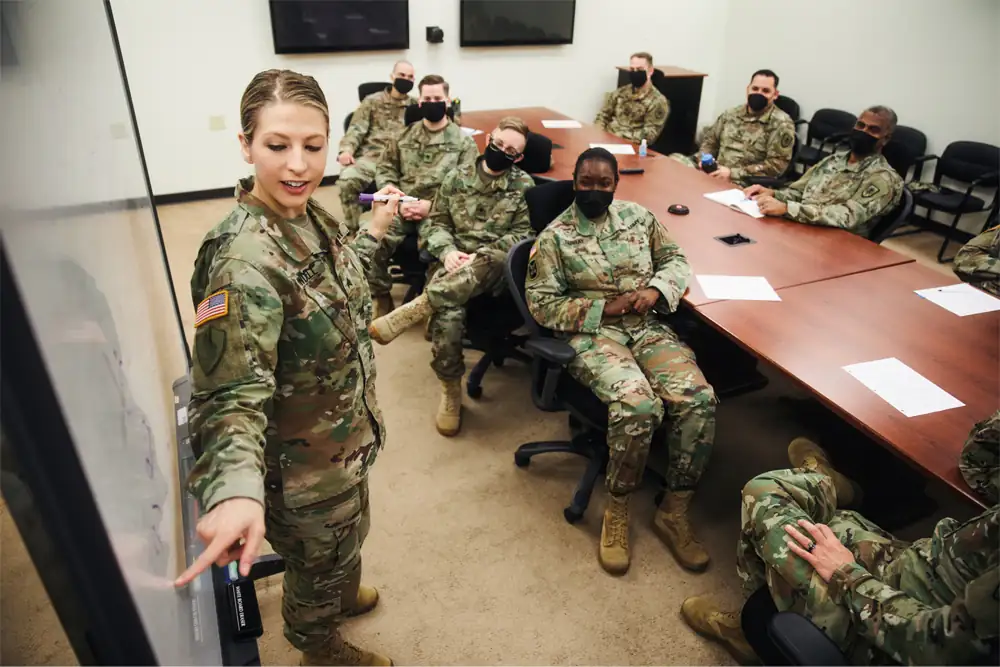 Military interpreter briefing a unit